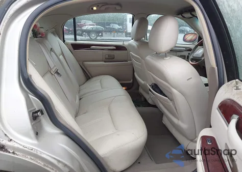 2004 Lincoln Town Car Ultimate из США, поврежденный, VIN 1LNHM83W44Y674497